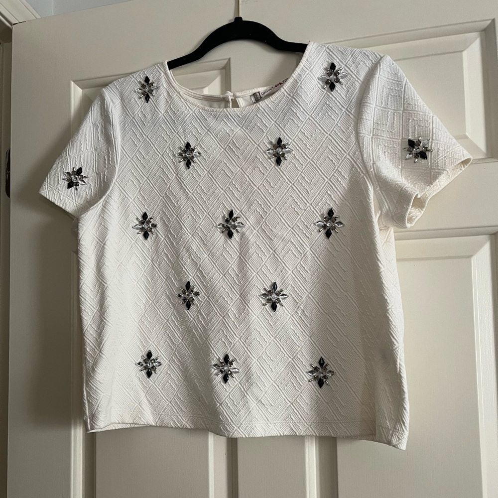 Chelsea & Violet White Textured Blouse with Black Pattern